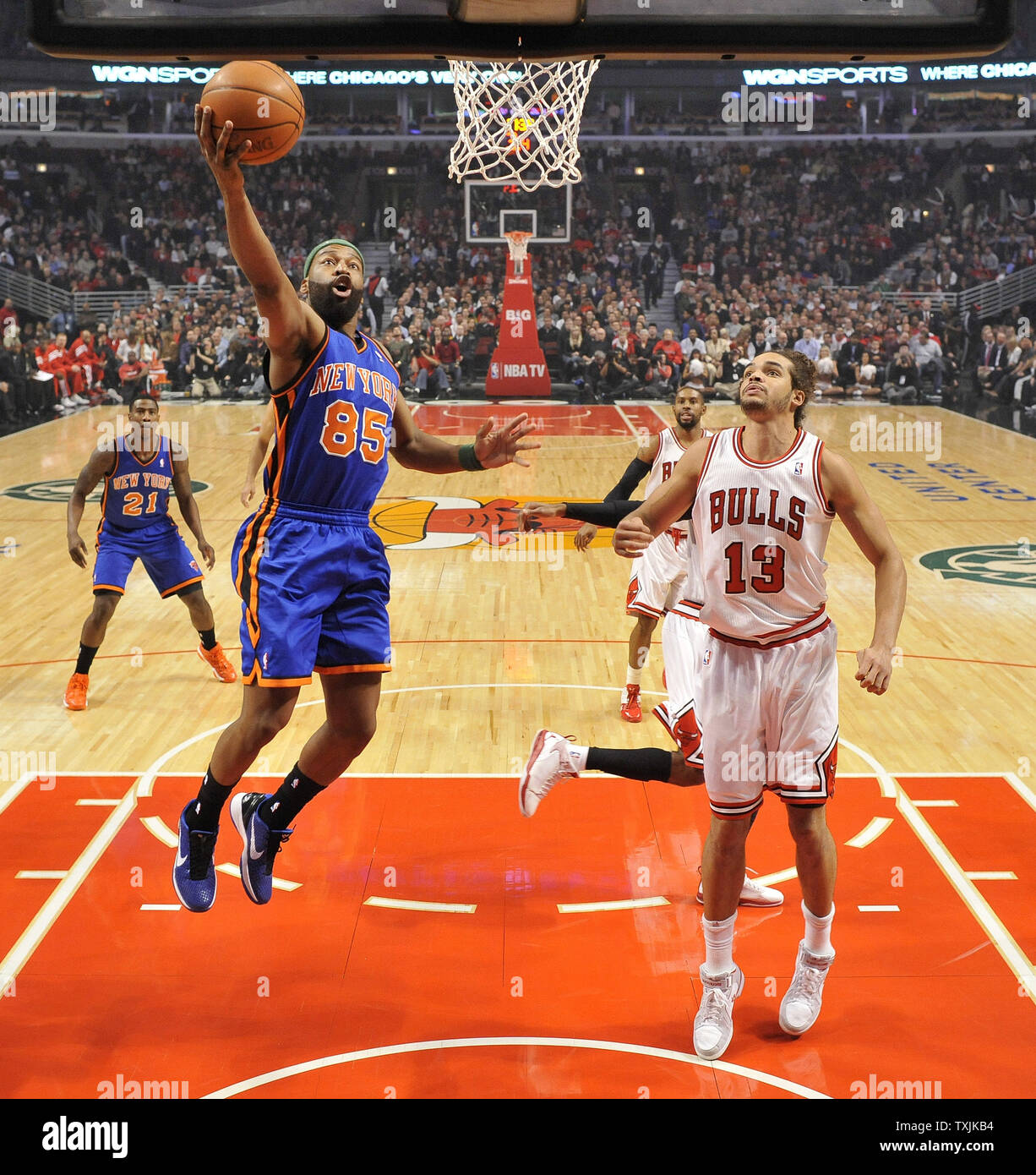 Chicago Bulls center Joakim Noah (R) reaches in on New York Knicks guard Baron  Davis during the fourth quarter at the United Center on March 12, 2012 in  Chicago. The Bulls won