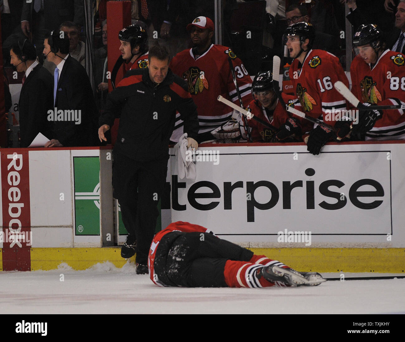 Chicago Blackhawks forward Marian Hossa (81) is knocked out by a Phoenix Coyotes player during the first  period of game 3 of the NHL Western Conference quarterfinals at the United Center on April 17, 2012 in Chicago.     UPI/David Banks Stock Photo