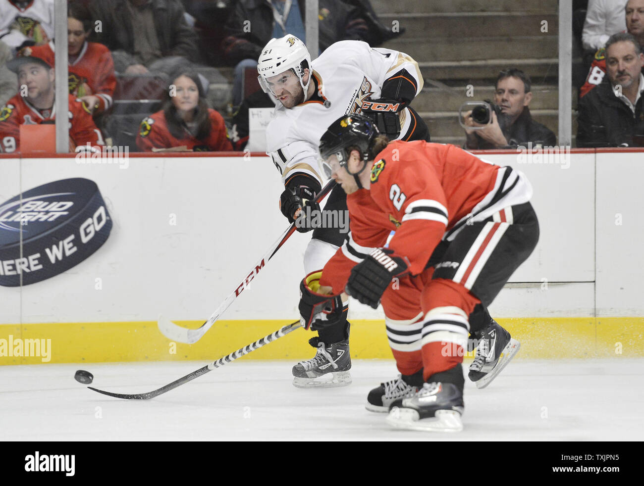 Anaheim Ducks right wing Kyle Palmieri (L) shoots as Chicago Blackhawks defenseman Duncan Keith  defends during the second period at the United Center in Chicago on February 12, 2013. The Ducks won 3-2 in a shootout.     UPI/Brian Kersey Stock Photo