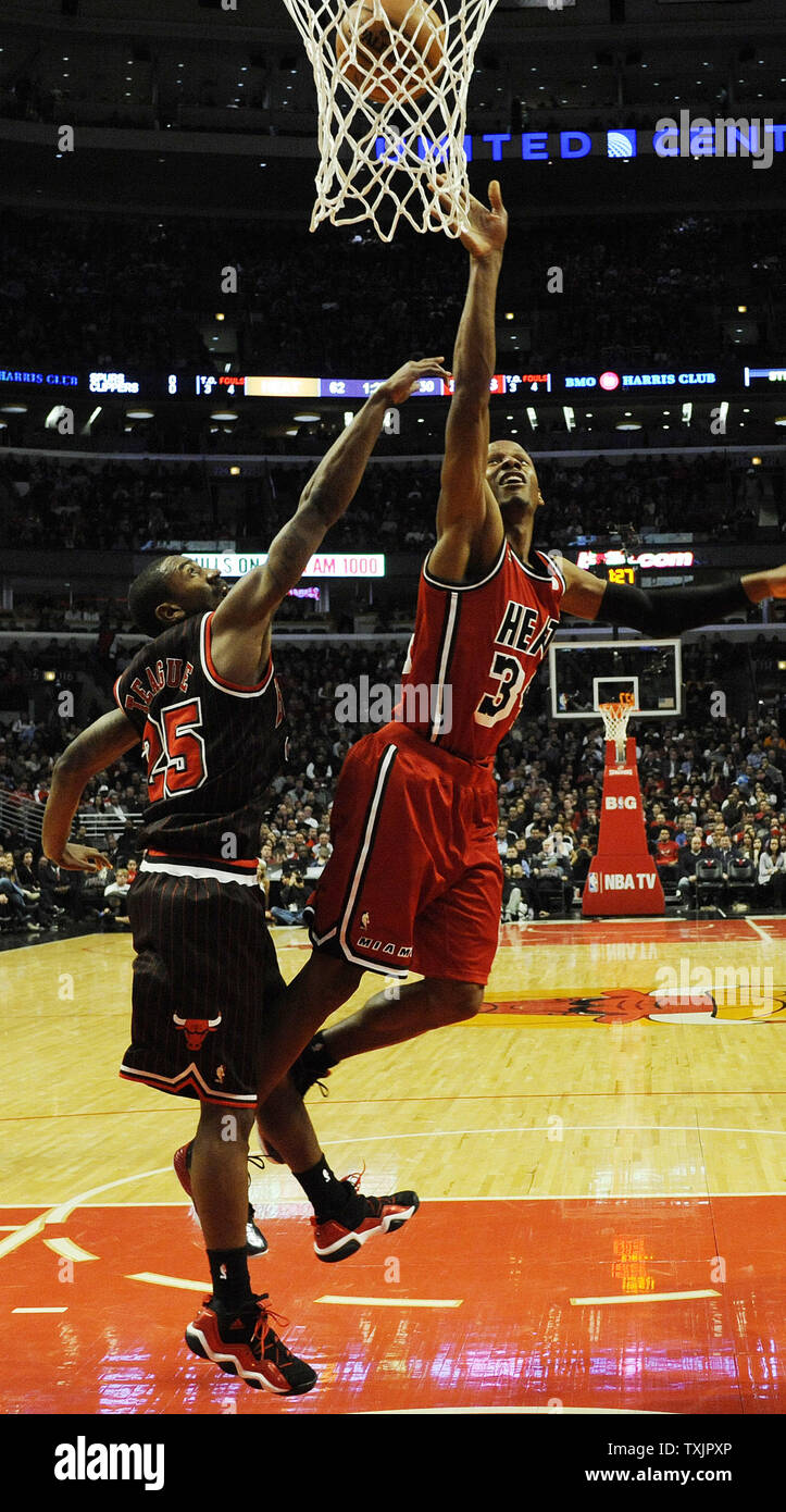 Miami Heat shooting guard Ray Allen (34) is defended by Chicago Bulls point guard Marquis Teague (25) during the second half at the United Center in Chicago on February 21, 2013.     UPI/David Banks Stock Photo