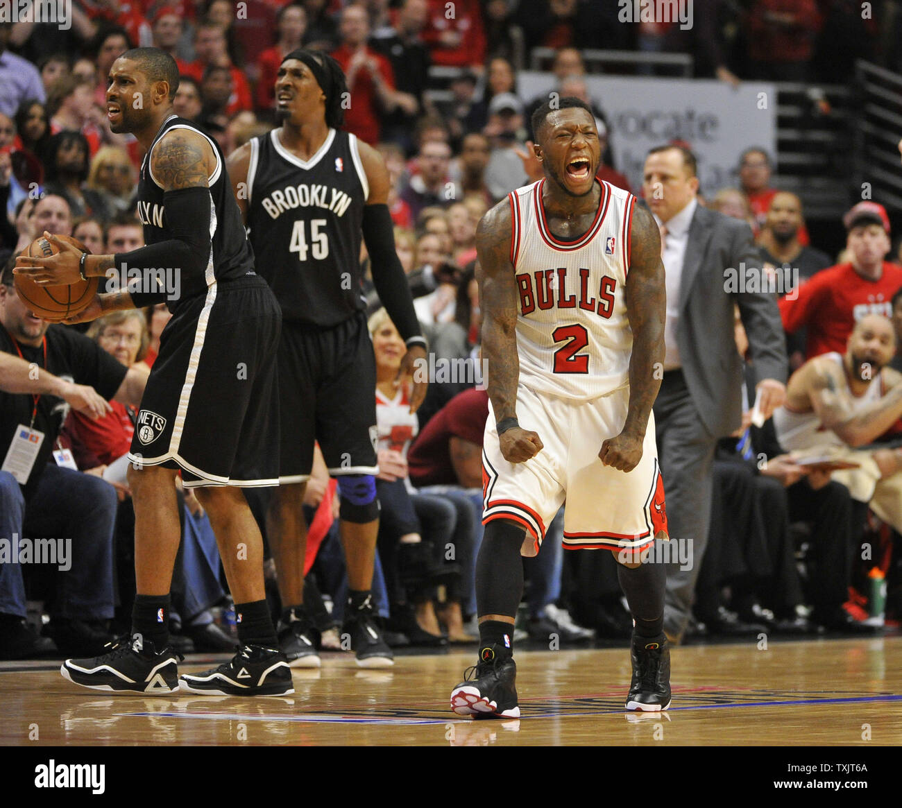 Chicago Bulls Guard Nate Robinson R Reacts To A Call During The Fourth Quarter Of Game 4 Of The Nba Eastern Conference Quarterfinals Against The Brooklyn Nets During The 2013 Nba Playoffs