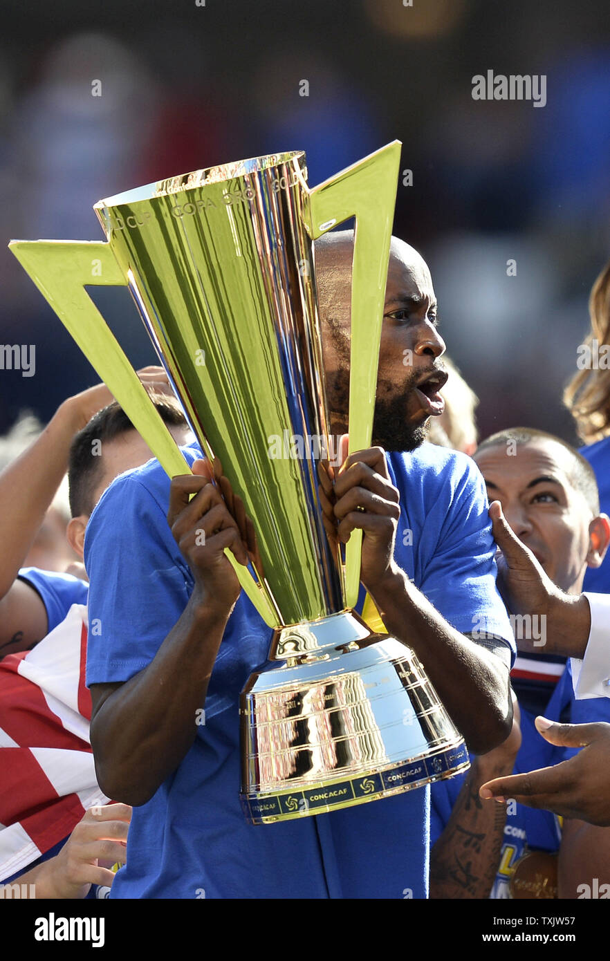 United States team captain DaMarcus Beasley holds the Gold Cup after defeating Panama in the 2013 CONCACAF Gold Cup Final at Soldier Field in Chicago on July 28, 2013. The United States won 1-0.     UPI/Brian Kersey Stock Photo