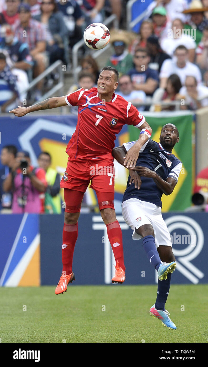 Panama forward Blas Perez (L) and United States defender DaMarcus Beasley go for the ball during the second half of the 2013 CONCACAF Gold Cup Final at Soldier Field in Chicago on July 28, 2013. The United States won 1-0.     UPI/Brian Kersey Stock Photo