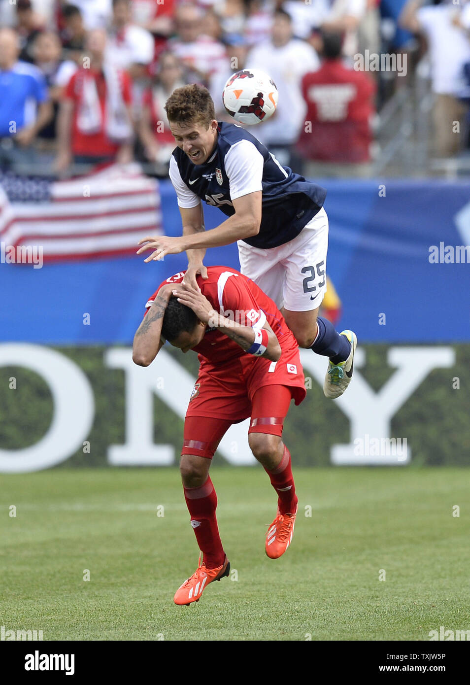 Panama forward Blas Perez (L) and United States defender Matt Besler go for the ball during the second half of the 2013 CONCACAF Gold Cup Final at Soldier Field in Chicago on July 28, 2013. The United States won 1-0.     UPI/Brian Kersey Stock Photo