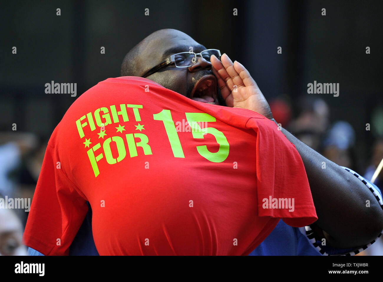Elmer Head yells at a rally in support of striking fast food workers, who walked off the job in nearly 60 cities, at Federal Plaza in Chicago on August 29, 2013.  Strikers are calling for an increase in the Federal minimum wage from $7.25 to $15 per hour.     UPI/Brian Kersey Stock Photo