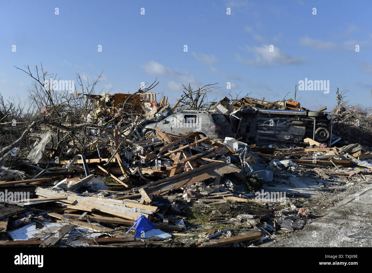 Debris is left in the aftermath of a tornado in Washington, Illinois on November 18, 2013. Six people died and hundreds of homes were destroyed in Illinois as 81 tornadoes were sighted on November 17 throughout 12 midwest states including the EF4 tornado that struck Washington, Illinois.     UPI/Brian Kersey.     UPI/Brian Kersey Stock Photo