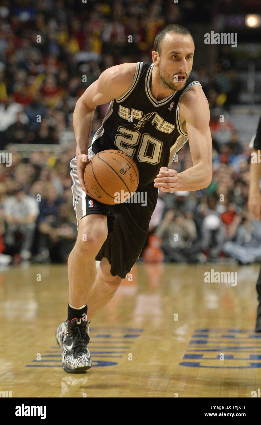San Antonio Spurs guard Manu Ginobili drives during the fourth quarter against the Chicago Bulls at the United Center in Chicago on March 11, 2014. The Spurs defeated the Bulls 104-96.     UPI/Brian Kersey Stock Photo