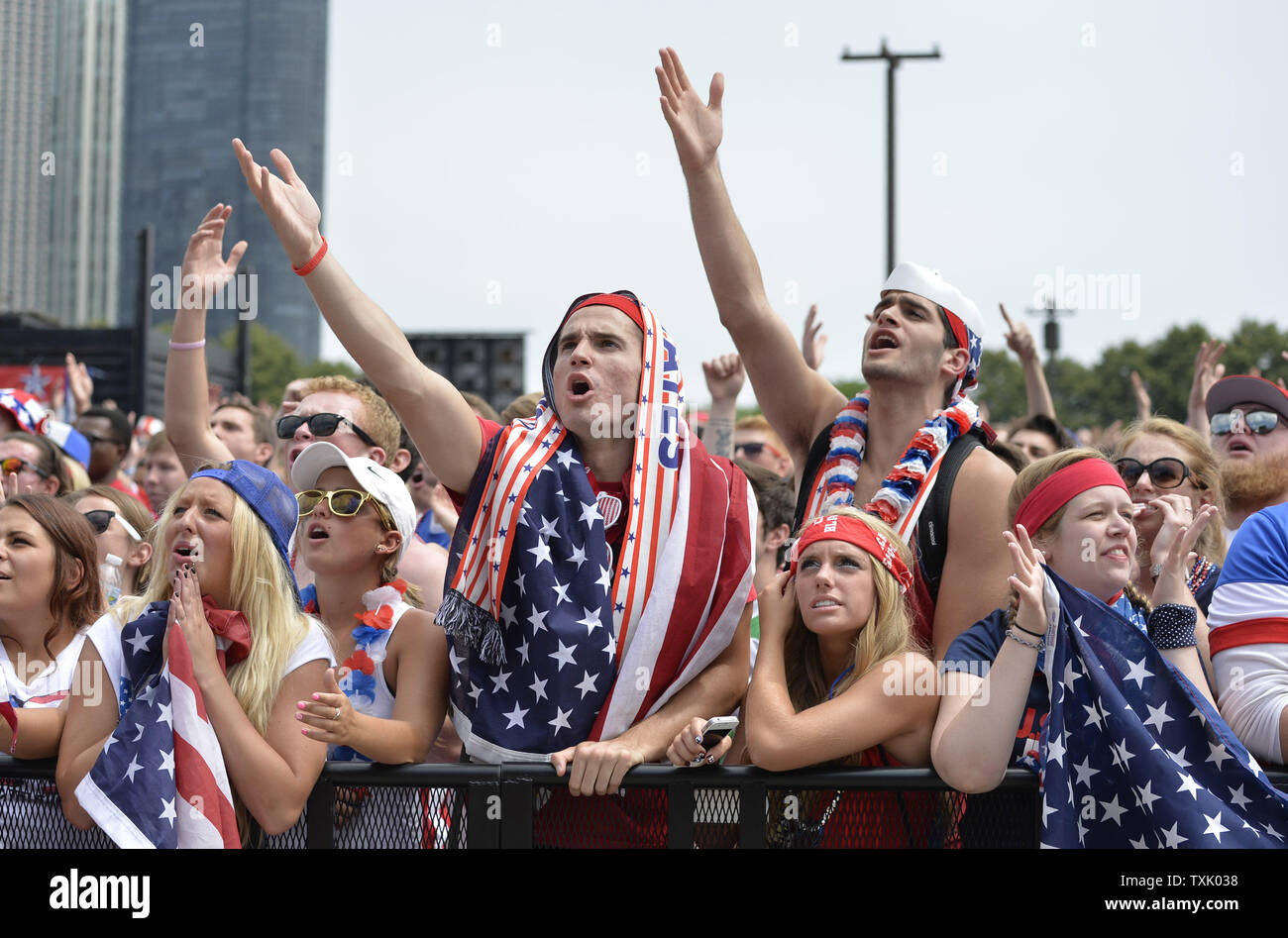 United States' soccer fans react to a call during the World Cup match between the United States and Germany at a World Cup watch event hosted by U.S. Soccer at Grant Park on June 26, 2014 in Chicago. The United States lost to Germany 1-0, but advanced to the World Cup round of 16 with a Portugal win over Ghana in their group.    UPI/Brian Kersey Stock Photo