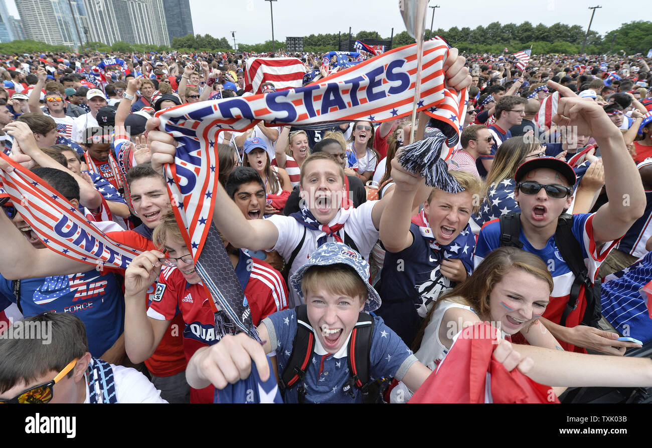 United States' soccer fans cheer after finding out that their team advanced out of the so-called 'group of death' at a World Cup watch event hosted by U.S. Soccer at Grant Park on June 26, 2014 in Chicago. The United States lost to Germany 1-0, but advanced to the World Cup round of 16 with a Portugal win over Ghana in their group.    UPI/Brian Kersey Stock Photo