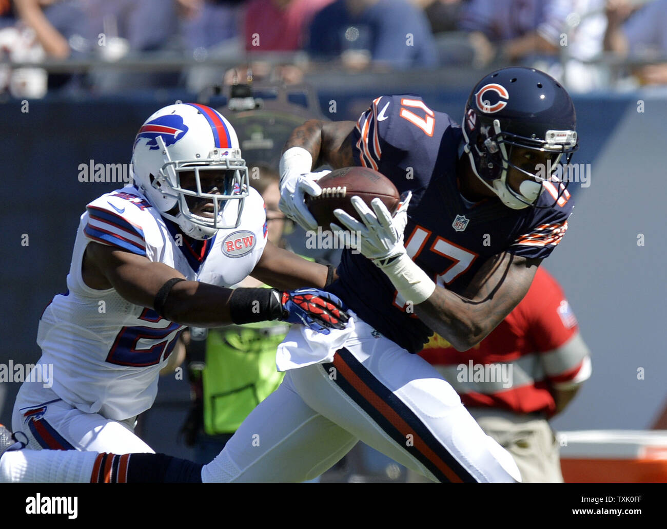 Chicago Bears wide receiver Alshon Jeffery (R) hauls in a 44-yard reception as Buffalo Bills cornerback Leodis McKelvin defends during the first quarter at Soldier Field on September 7, 2014 in Chicago.     UPI/Brian Kersey Stock Photo