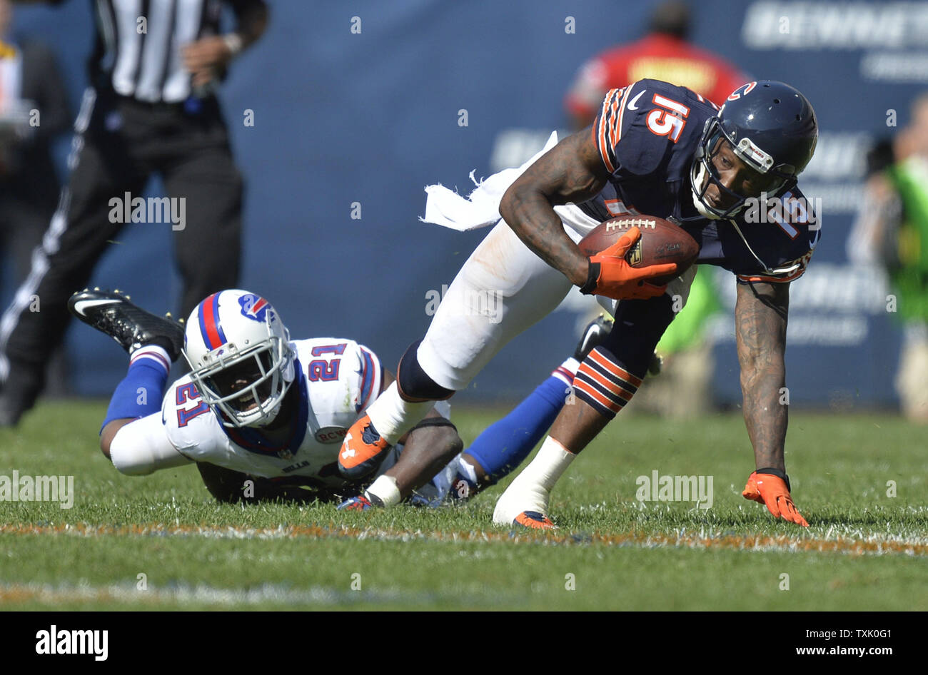 Chicago Bears wide receiver Brandon Marshall falls as Buffalo Bills cornerback Leodis McKelvin defends after Marshall caught a pass for a 15-yard gain during the fourth quarter at Soldier Field on September 7, 2014 in Chicago. The Bills defeated the Bears 23-20 in overtime.     UPI/Brian Kersey Stock Photo