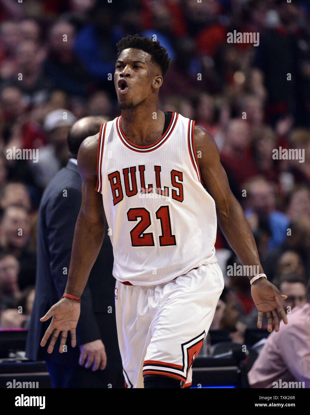 Chicago Bulls guard Jimmy Butler reacts after scoring during the first ...