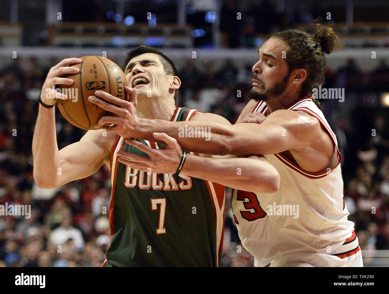 Chicago Bulls center Joakim Noah (R) fouls Milwaukee Bucks forward Ersan Ilyasova as he drives to the basket during the third quarter of game 2 the first round of the NBA Playoffs at the United Center on April 20, 2015 in Chicago. The Bulls defeated the Bucks 91-82 and lead the best of seven series 2-0.     Photo by Brian Kersey/UPI Stock Photo