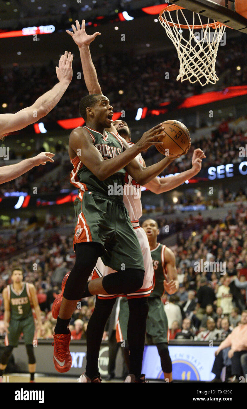 Milwaukee Bucks guard Khris Middleton (L) drives the basket as Chicago Bulls center Joakim Noah defends during the fourth quarter of game 2 the first round of the NBA Playoffs at the United Center on April 20, 2015 in Chicago. The Bulls defeated the Bucks 91-82 and lead the best of seven series 2-0.     Photo by Brian Kersey/UPI Stock Photo
