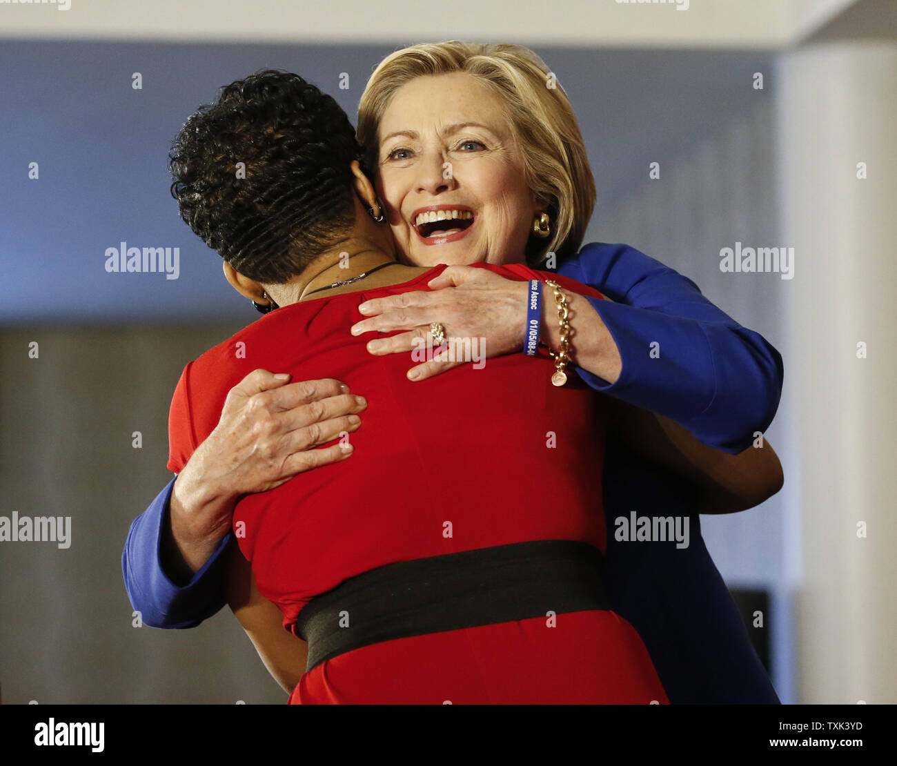 Democratic Presidential hopeful Hillary Clinton, right, hugs Geneva Reed-Veal, left, the mother of Sandra Bland, who was found dead in a Texas jail cell, before speaking to supporters at a 'Get Out the Vote' organizing event at the Parkway Ballroom in Chicago on February 17, 2016. Clinton's appearance in Chicago's Bronzeville neighborhood, a historic African American community, is part of a major effort of her campaign to reach out to black voters. Photo by Kamil Krzaczynski/UPI Stock Photo