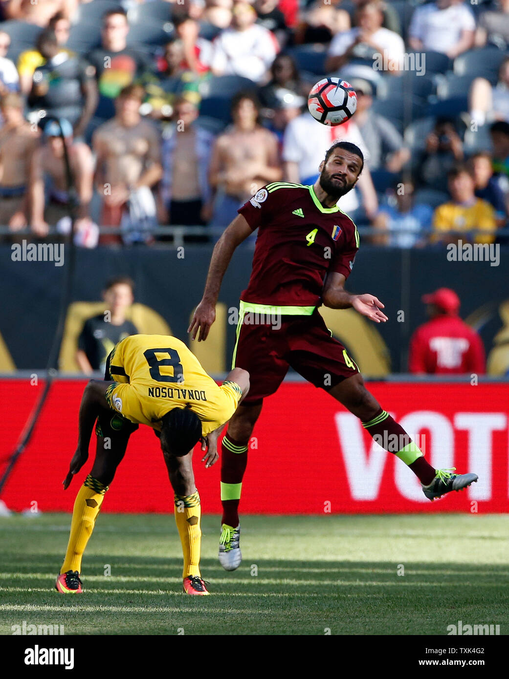 venezuela defender oswaldo vizcarrondo l heads the ball away from jamaica forward clayton donaldson during the second half of a 2016 copa america centenario group c match at soldier field in chicago alamy