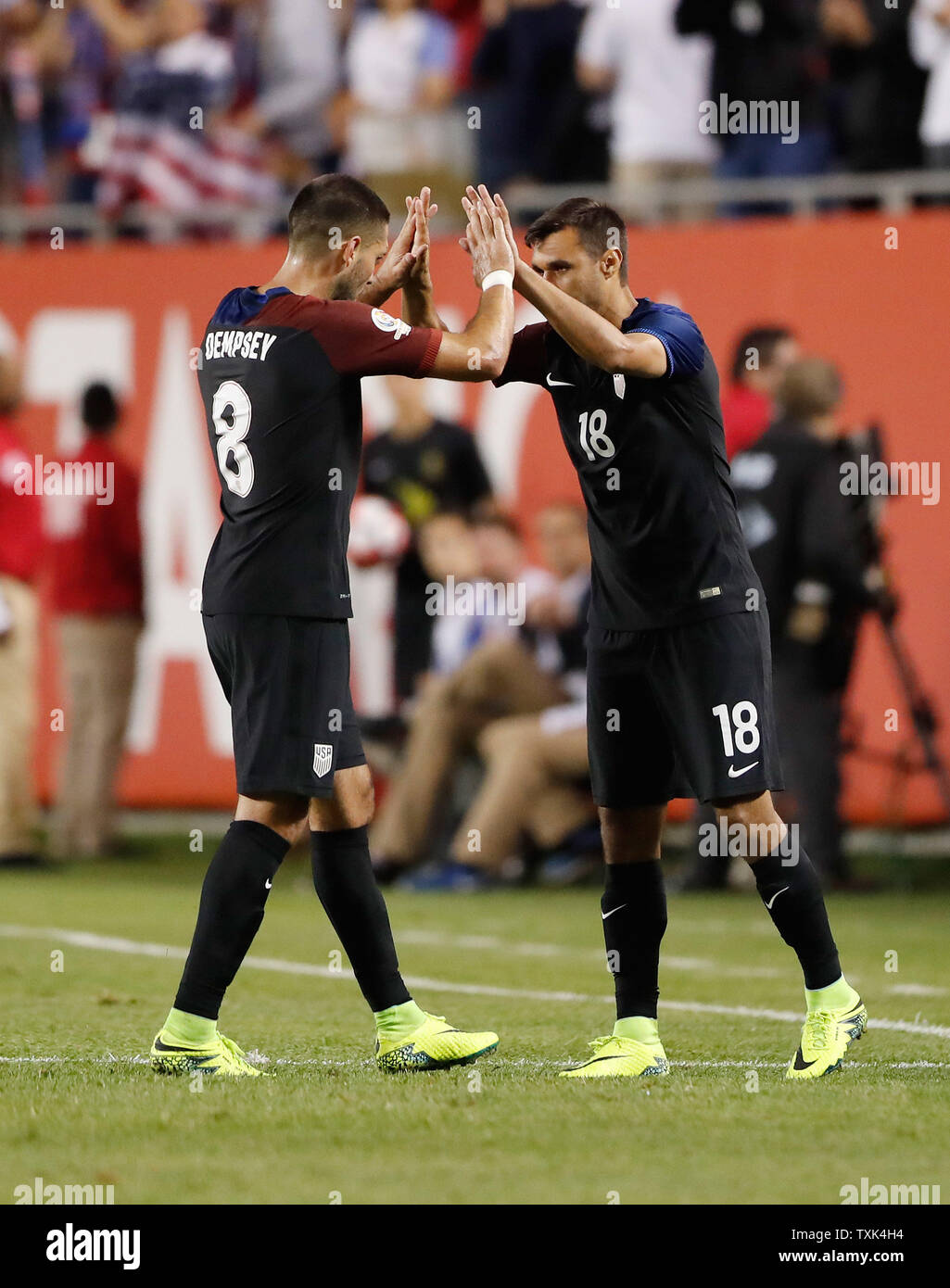 United States forward Chris Wondolowski (R) high -fives United States midfielder Clint Dempsey during the first half of a 2016 Copa America Centenario Group A match at Soldier Field in Chicago on June 7, 2016. The United States defeated Costa Rica 4-0.     Photo by Brian Kersey/UPI Stock Photo