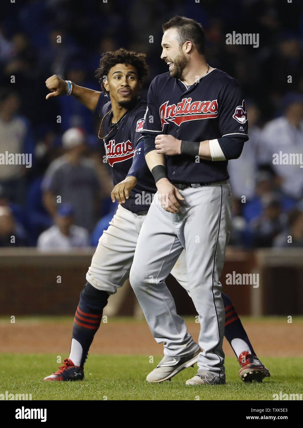 Cleveland Indians shortstop Francisco Lindor (L) and second baseman Jason Kipnis (R) smile before the bottom half of the ninth inning in game 4 of the World Series at Wrigley Field in Chicago, October 29, 2016. Kipnis hit a 3-RBI home run and powered the Indians to a 7-2 win and a 3-1 series lead. Photo by Kamil Krzaczynski/UPI Stock Photo