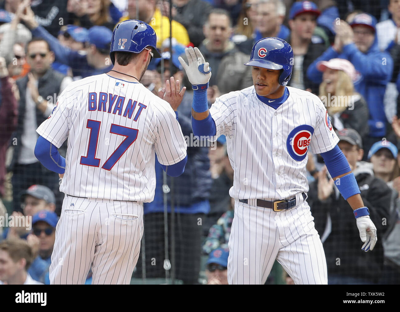 Chicago Cubs third baseman Kris Bryant celebrates with shortstop