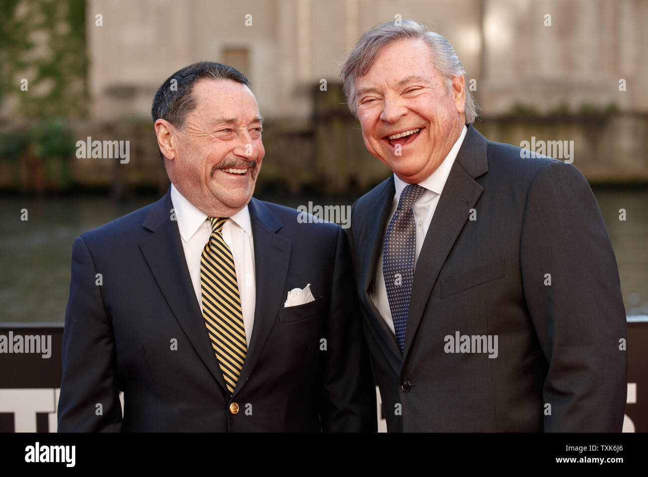 Peter Cullen, left and Frank Welker, the voices of 'Optimus Prime' and 'Megatron' respectively arrive on the red carpet at the Transformers The Last Knight movie Premiere on June 20, 2017 in Chicago.     Photo by John Gress/UPI Stock Photo