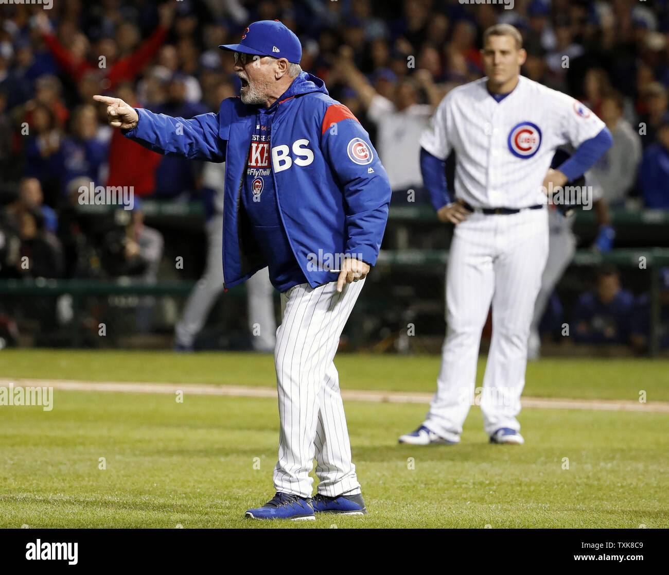 Chicago Cubs manager Joe Madden argues a call with home plate umpire