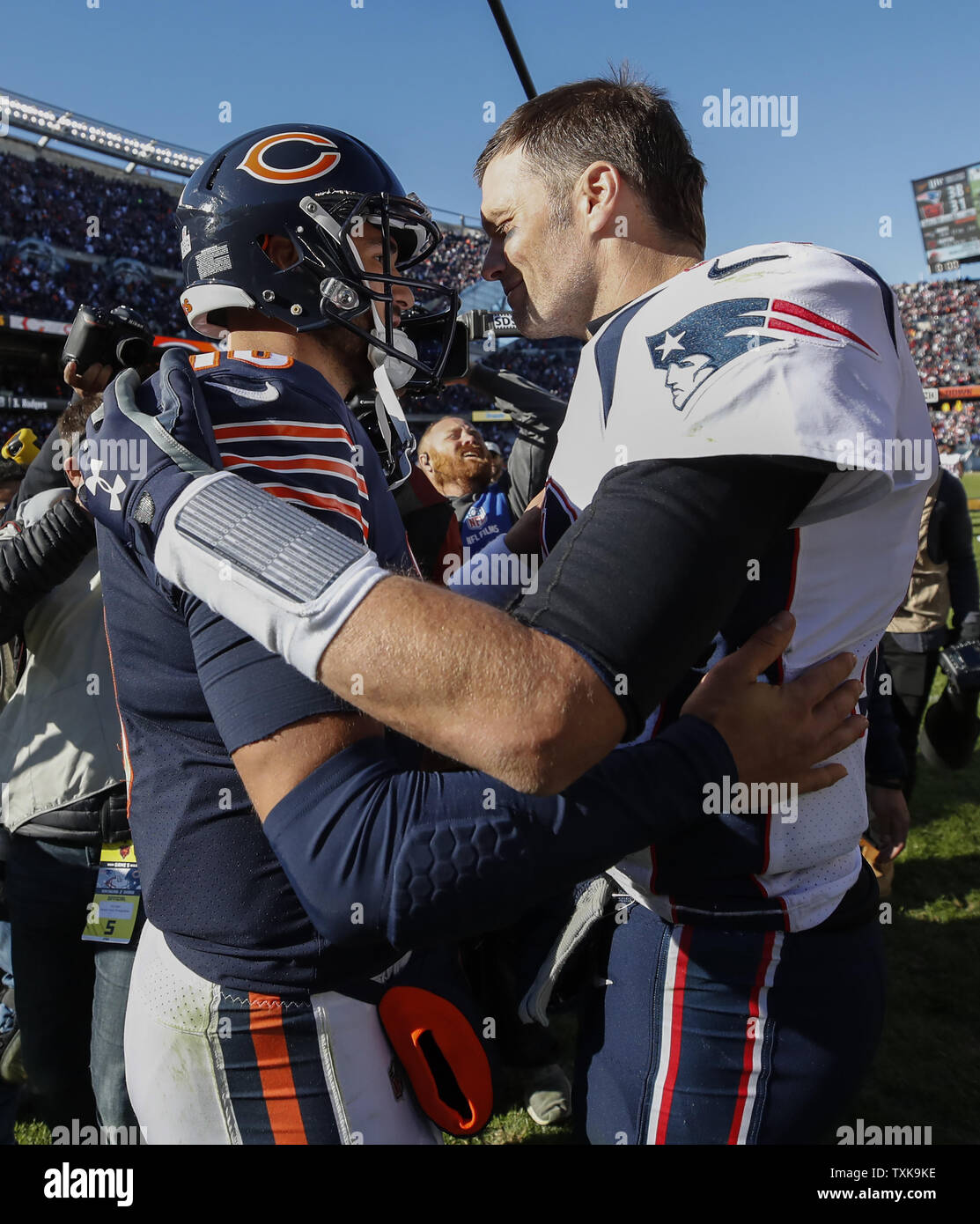 New England Patriots quarterback Tom Brady (12) shake hands with Chicago  Bears quarterback Mitchell Trubisky (10)