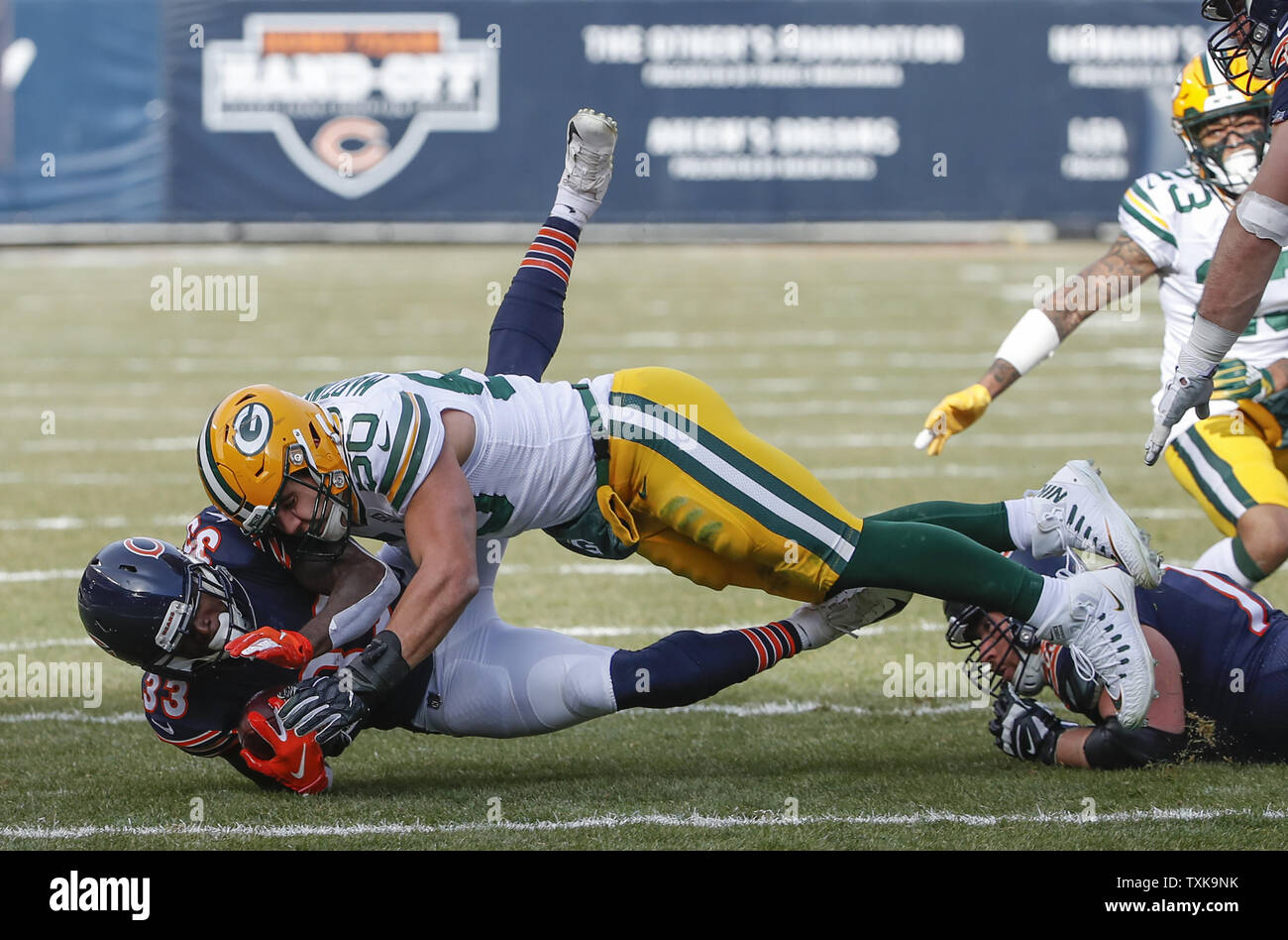 Chicago Bears running back Taquan Mizzell (33) is sacked by Green Bay Packers inside linebacker Blake Martinez (50) during the first half at Soldier Field in Chicago on December 16, 2018. Photo by Kamil Krzaczynski/UPI Stock Photo