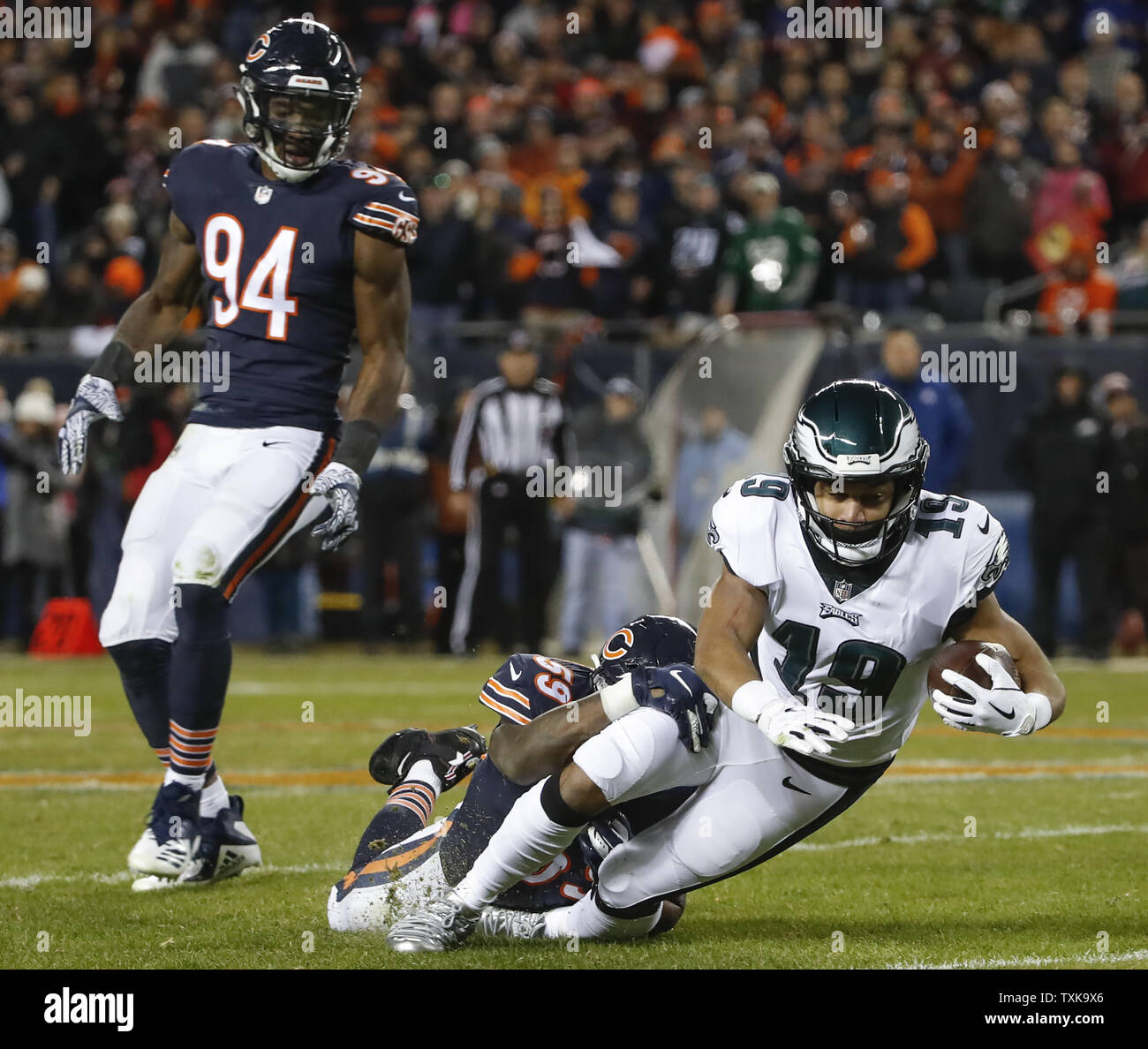 Chicago Bears inside linebacker Danny Trevathan (59) tackles Philadelphia Eagles wide receiver Golden Tate (19) during the second half of an NFC Wild Card playoff game at Soldier Field in Chicago on January 6, 2019. Photo by Kamil Krzaczynski/UPI Stock Photo