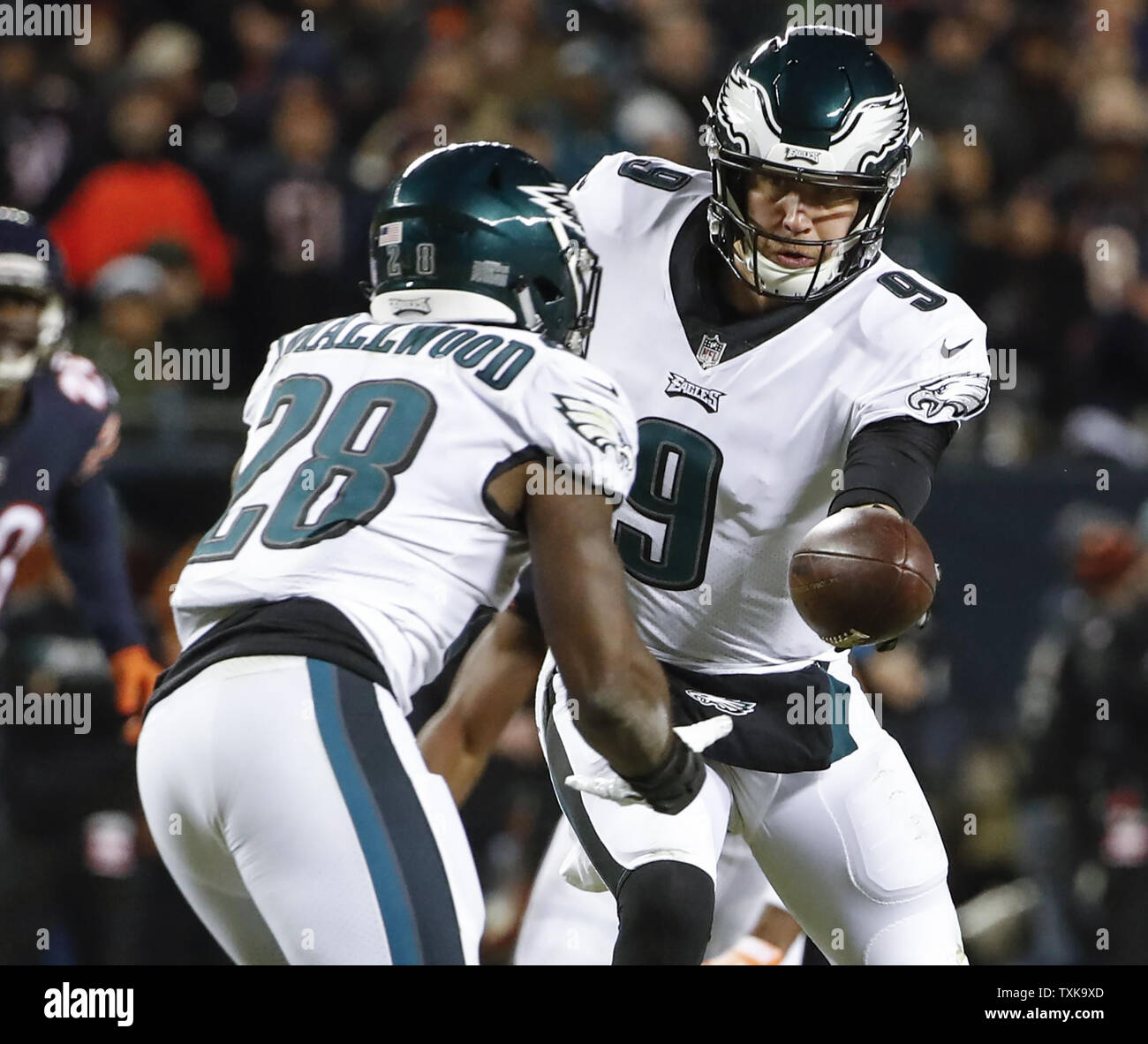 Philadelphia Eagles quarterback Nick Foles (9) passes the ball to running back Wendell Smallwood (28) against the Chicago Bears during the second half of an NFC Wild Card playoff game at Soldier Field in Chicago on January 6, 2019. Photo by Kamil Krzaczynski/UPI Stock Photo