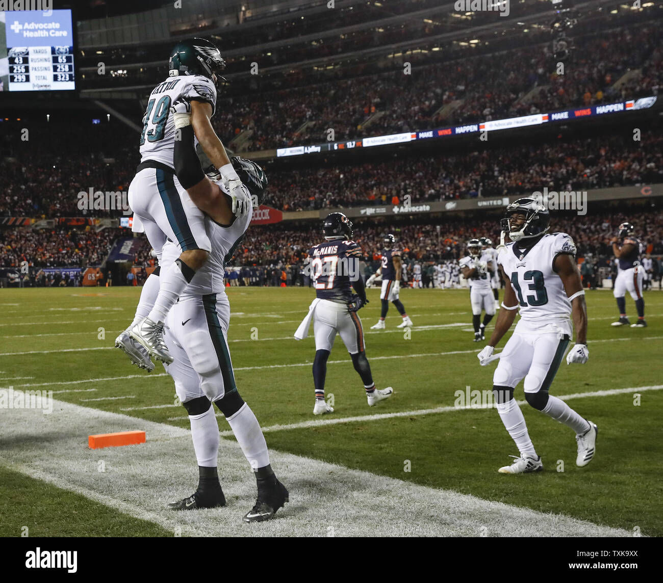 Philadelphia Eagles wide receiver Golden Tate (19) celebrates with offensive tackle Lane Johnson (65) after scoring the game-winning touchdown in the final minute of the game against Chicago Bears NFC Wild Card playoff game at Soldier Field in Chicago on January 6, 2019.  Eagles won 16-15.   Photo by Kamil Krzaczynski/UPI Stock Photo
