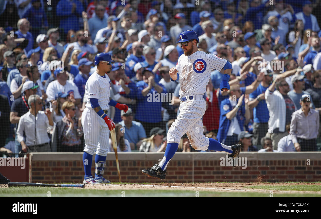 Chicago Cubs left fielder Ben Zobrist scores against the Pittsburgh Pirates in the second inning in at Wrigley Field on April 8, 2019 in Chicago. Photo by Kamil Krzaczynski/UPI Stock Photo