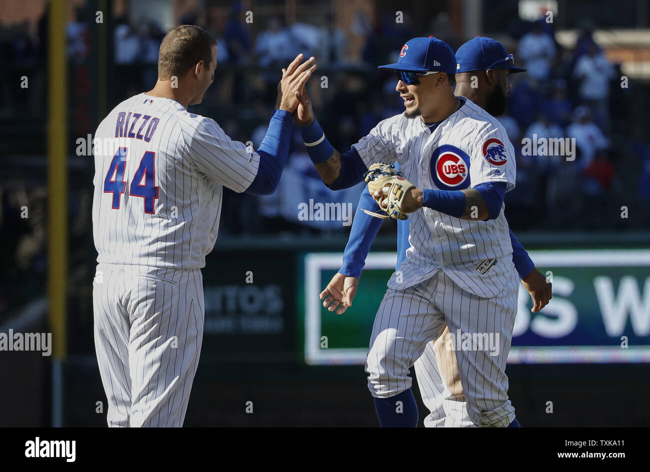 Chicago Cubs first baseman Anthony Rizzo (44) celebrates with shortstop Javier Baez (9) after defeating the Pittsburgh Pirates in a MLB game at Wrigley Field on April 8, 2019 in Chicago. Photo by Kamil Krzaczynski/UPI Stock Photo
