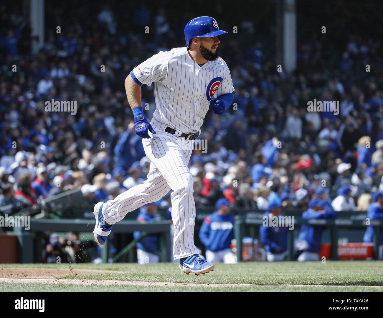 Chicago Cubs third baseman David Bote rounds the bases after hitting solo home run against the Los Angeles Angels in the fourth inning at Wrigley Field on April 12, 2019 in Chicago. Photo by Kamil Krzaczynski/UPI Stock Photo