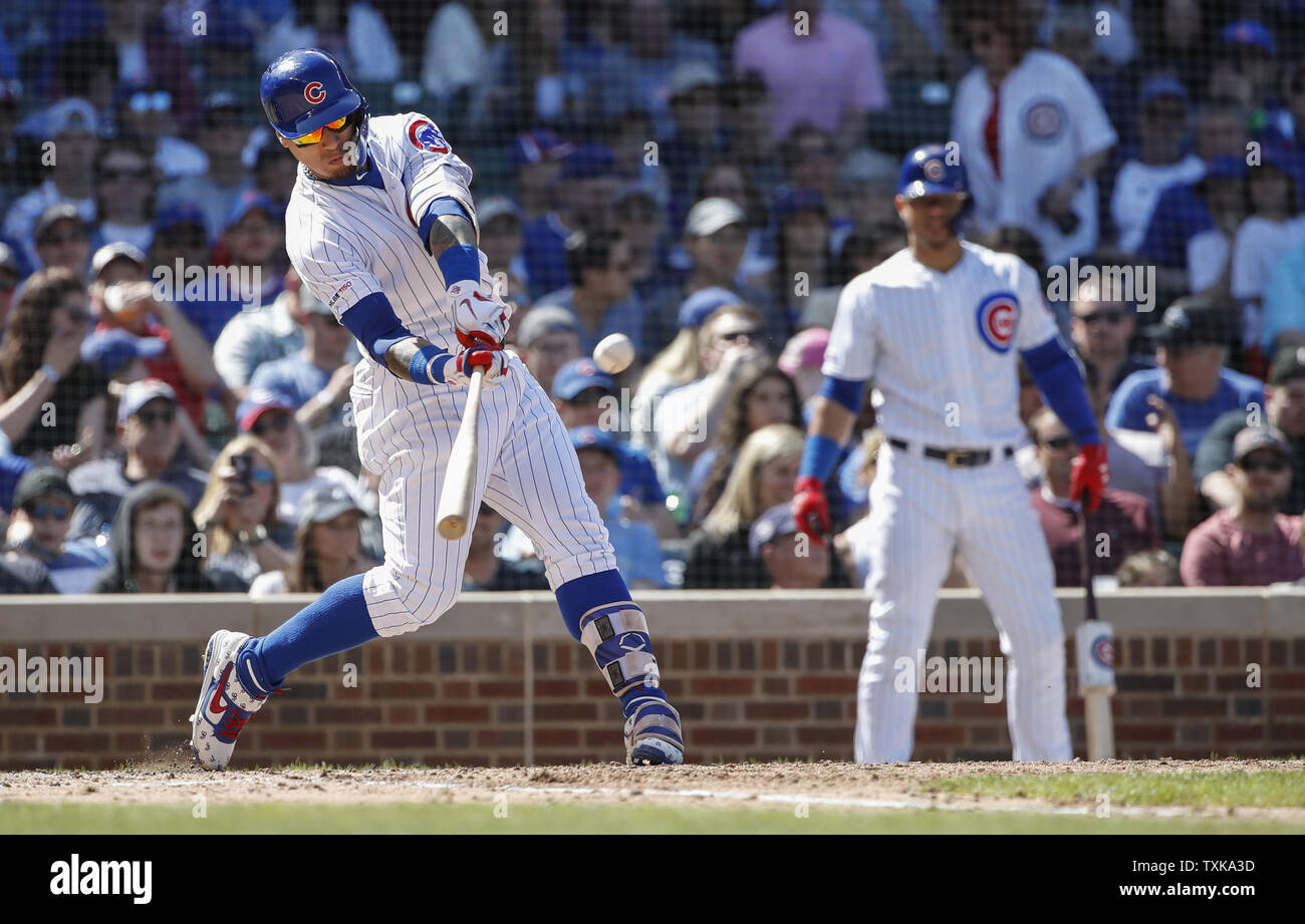 Chicago Cubs' Javier Baez hits an RBI-triple against the Arizona Diamondbacks in the sixth inning at Wrigley Field on April 21, 2019 in Chicago. Photo by Kamil Krzaczynski/UPI Stock Photo