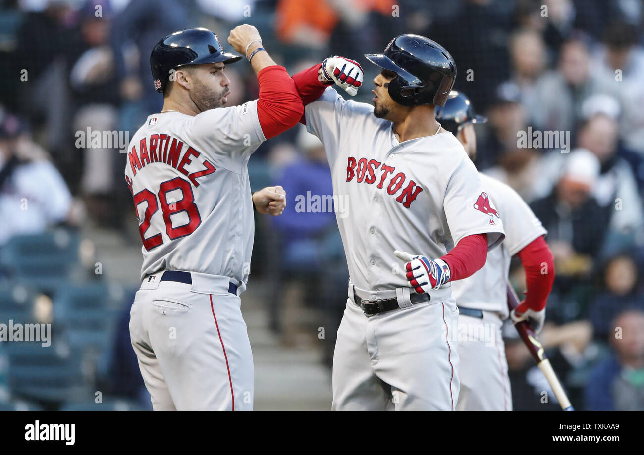 Boston Red Sox's Xander Bogaerts (R) celebrates with J.D. Martinez (L) after hitting two-run home run against the Chicago White Sox in the third inning at Guaranteed Rate Field on May 4, 2019 in Chicago. Photo by Kamil Krzaczynski/UPI Stock Photo