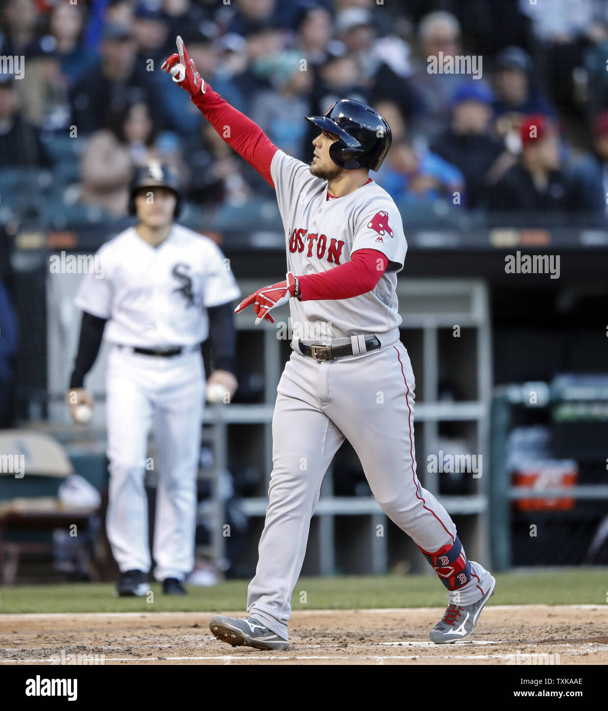 Boston Red Sox's Michael Chavis celebrates as he crosses home plate after hitting a solo home run off of Chicago White Sox starting pitcher Manny Banuelos in the third inning at Guaranteed Rate Field on May 4, 2019 in Chicago. Photo by Kamil Krzaczynski/UPI Stock Photo