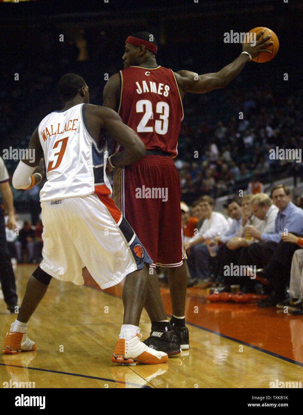 Cleveland Cavaliers Lebron James Keeps The Ball From Charlotte Bobcats Guard Gerald Wallace In The First Half At The Charlotte Coliseum In Charlotte N C On Thursday Nov 18 04 Upi Photo Nell Redmond Cleveland Cavaliers Lebron James Keeps The Ball From Charlotte Bobcats Guard Gerald Wallace In The First Half At The Charlotte Coliseum In Charlotte N C On Thursday Nov 18 04 Upi Photo Nell Redmond