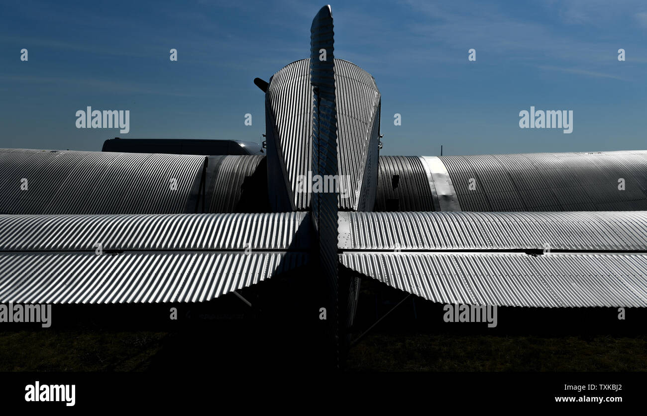 25 June 2019, Saxony-Anhalt, Dessau-Roßlau: A Junkers F 13 aircraft is standing at the airfield in Dessau. Exactly 100 years ago, an aircraft of this type took off for the first time in Dessau. The aircraft, designed by aircraft pioneer Hugo Junkers, was the world's first all-metal commercial aircraft and is regarded as a pioneer in civil aviation. Since 2016, the machine has again been manufactured in small series in Switzerland. Photo: Hendrik Schmidt/dpa-Zentralbild/dpa Stock Photo