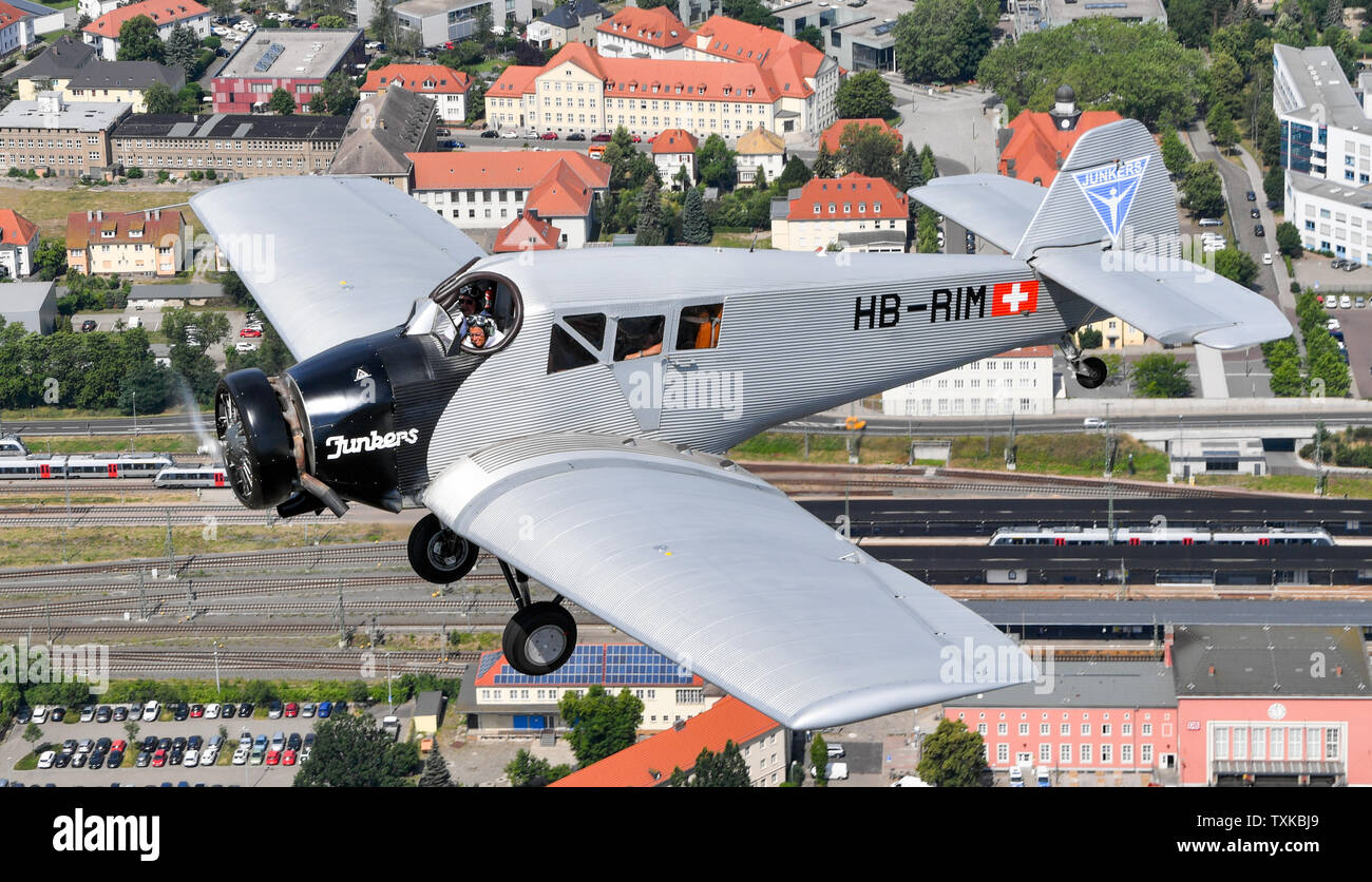 25 June 2019, Saxony-Anhalt, Dessau-Roßlau: The pilots Dieter Morszeck and Kurt Waldmeier steer the Junkers F 13 via Dessau. Exactly 100 years ago, an aircraft of this type took off for the first time in Dessau. The aircraft, designed by aircraft pioneer Hugo Junkers, was the world's first all-metal commercial aircraft and is regarded as a pioneer in civil aviation. Since 2016, the machine has again been manufactured in small series in Switzerland. The 100th anniversary of the first flight will be celebrated in Dessau with an airport festival, which will also include demonstration flights. Pho Stock Photo