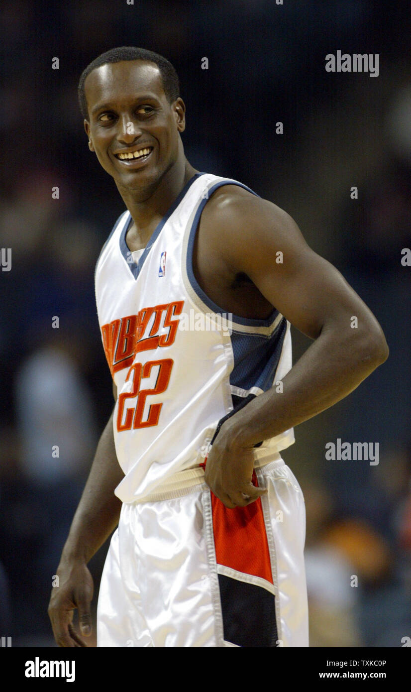 Charlotte Bobcats guard Brevin Knight jokes with an opponent at the start  of the second half against the Los Angeles Clippers at the Charlotte  Bobcats Arena in Charlotte, N.C. on December 23