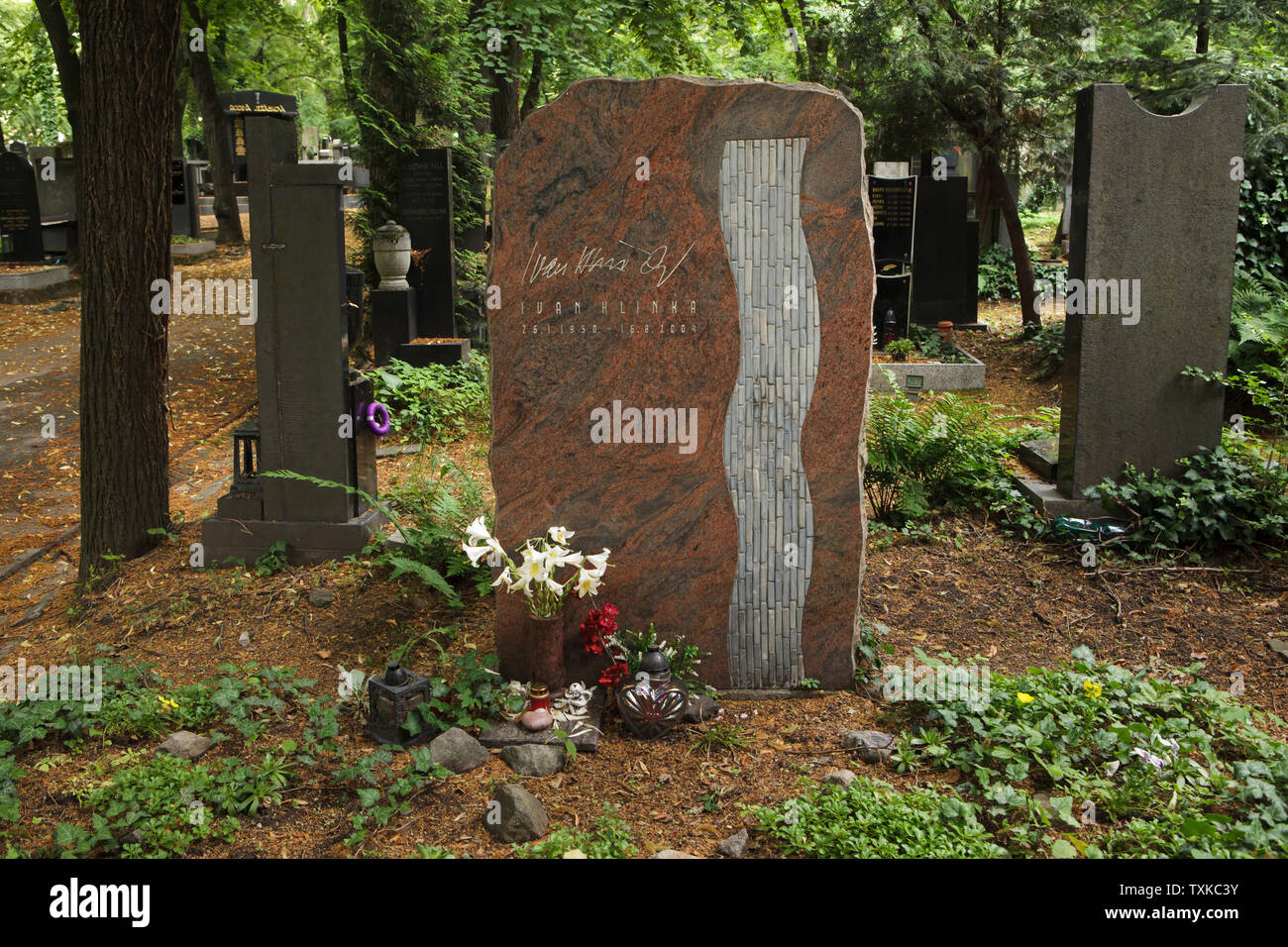 Grave of Czech ice hockey player and coach Ivan Hlinka (1950 - 2004) at Olšany Cemetery in Prague, Czech Republic. Stock Photo