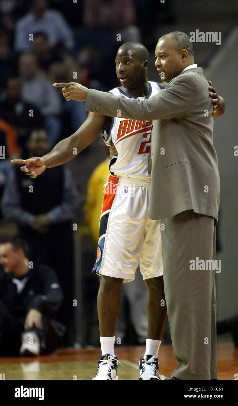 Charlotte Bobcats guard Raymond Felton, left, and head coach Bernie Bickerstaff talk during a break in the action as the Bobcats play the Miami Heat at the Charlotte Bobcats Arena in Charlotte, N.C. on January 27, 2006. (UPI Photo/Nell Redmond) Stock Photo