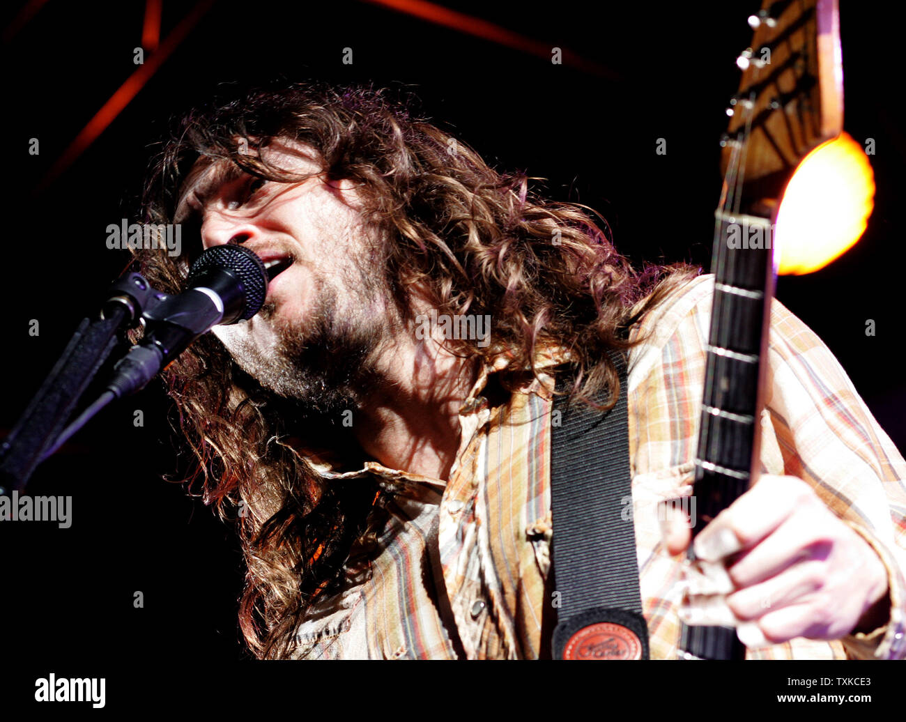 Guitarist John Frusciante of the Red Hot Chili Peppers performs between races at the NASCAR NEXTEL Challenge at Lowe's Motor Speedway in Charlotte, NC on May 20, 2006.  (UPI Photo/Bob Carey) Stock Photo