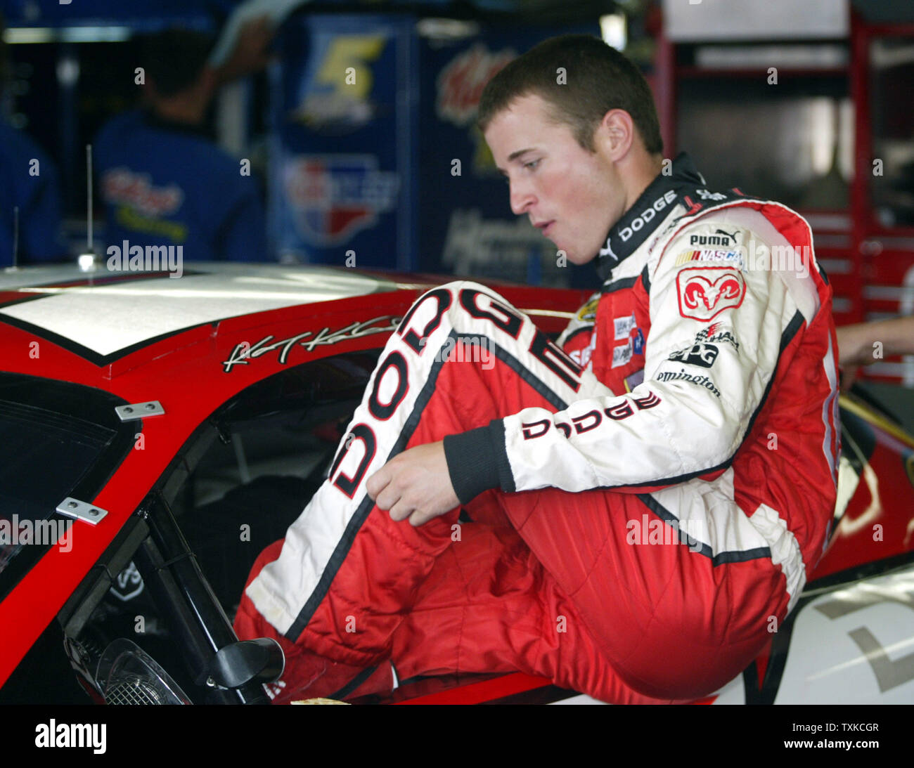 NASCAR race car driver Kasey Kahne climbs into his race car before the start of Nextel Cup practice for the Coca-Cola 600 at the Lowe's Motor Speedway in Charlotte, N.C., on May 27, 2006. (UPI Photo/Nell Redmond) Stock Photo