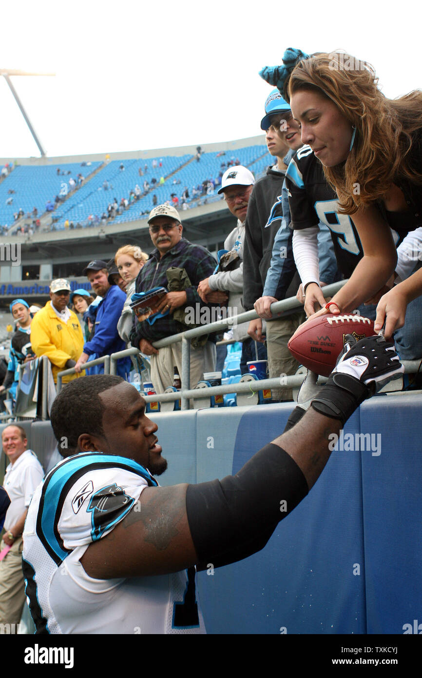 Carolina Panthers wide receiver Keyshawn Johnson laughs before his