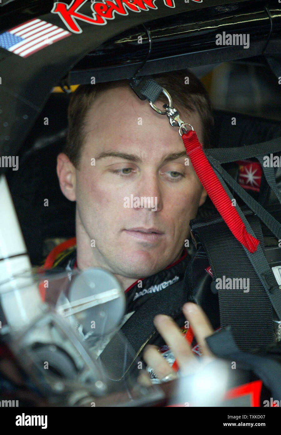 NASCAR driver Kevin Harvick straps himself into his Goodwrench Chevrolet before the start of practice for the Bank of America 500 NASCAR Nextel Cup race at the Lowe's Motor Speedway near Charlotte, N.C., on October 12, 2006. (UPI Photo/Nell Redmond) Stock Photo