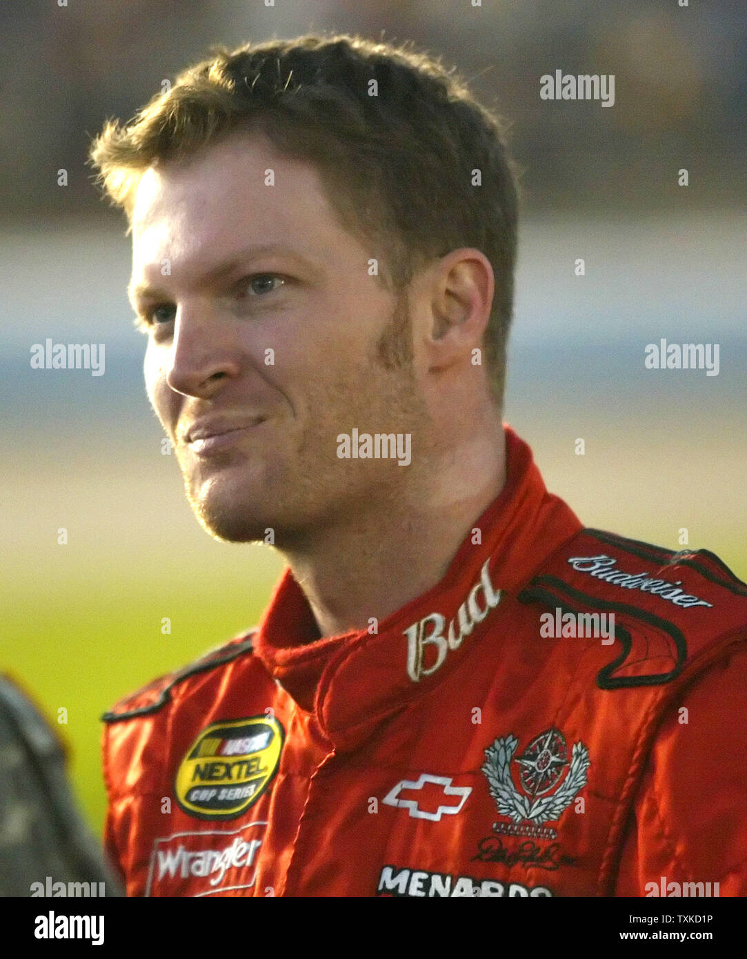 Race Car Driver Dale Earnhardt Jr. Stands On Pit Road Before The Start Of The Bank Of America