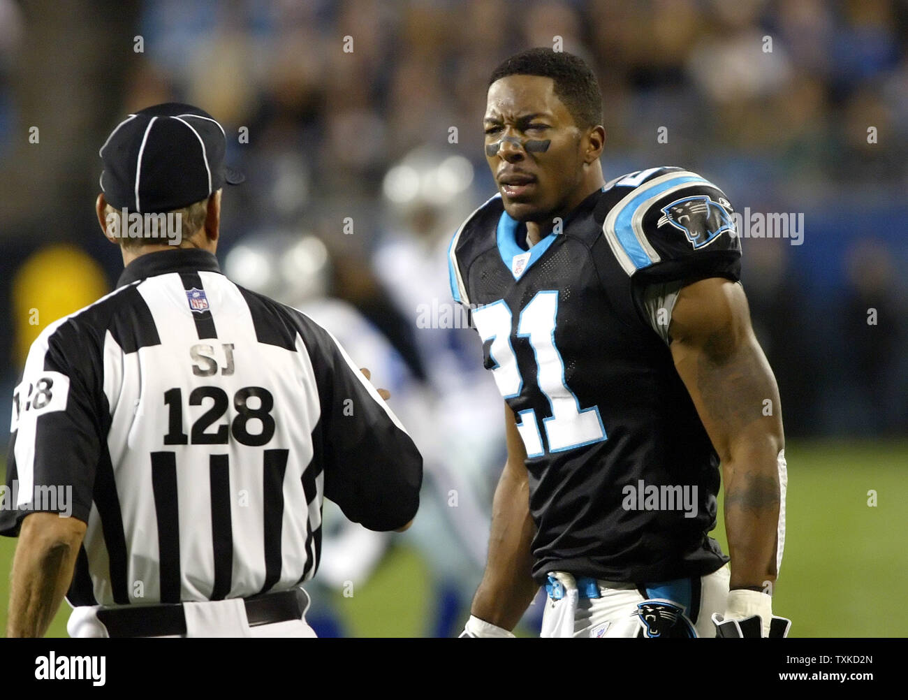 Carolina Panthers cornerback Ken Lucas argues with side judge Larry