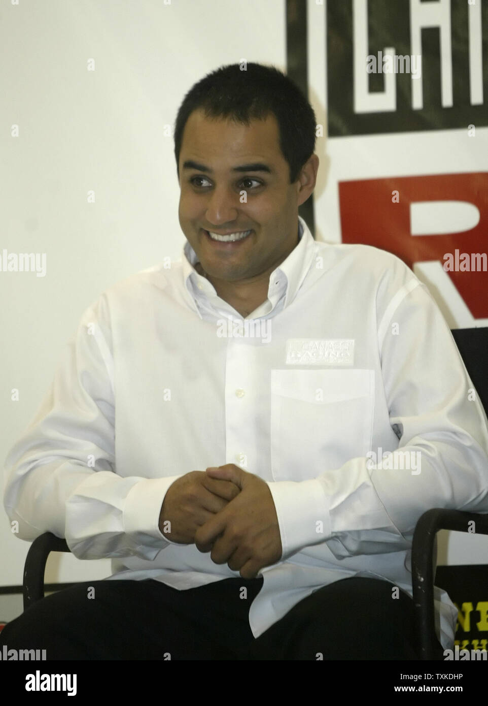 NASCAR driver Juan Pablo Montoya of Colombia smiles during a press conference at Chip Ganassi Racing in Concord, NC on January 22, 2007 during the NASCAR NEXTEL Cup Media Tour. (UPI Photo/Nell Redmond) Stock Photo