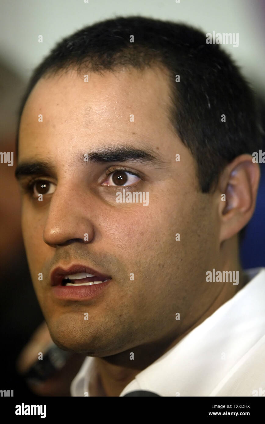 NASCAR driver Juan Pablo Montoya of Colombia answers questions during a press conference at Chip Ganassi Racing in Concord, NC on January 22, 2007 during the NASCAR NEXTEL Cup Media Tour. (UPI Photo/Nell Redmond) Stock Photo